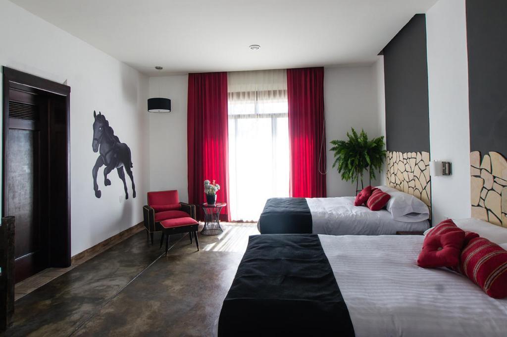 Hotel Casa Delina 코미탄 데 도밍게스 객실 사진
